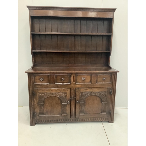 17 - An 18th century style oak dresser, width 137cm, depth 47cm, height 180cm