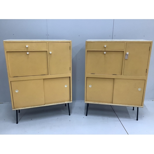 18 - A pair of 1960's melamine household cabinets, each width 91cm, depth 41cm, height 127cm