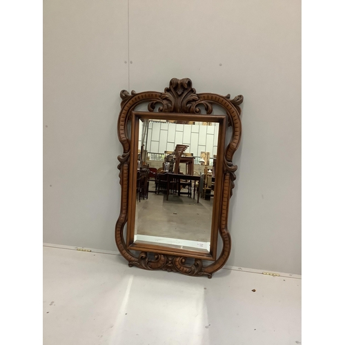 25 - A Victorian style carved wood wall mirror, width 80cm, height 126cm