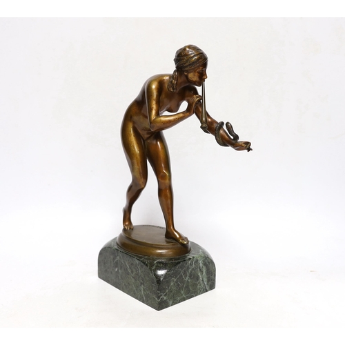 252 - After Rudolf Kaesbach (1873-1955), a bronze model of a snake charmer, 29cm