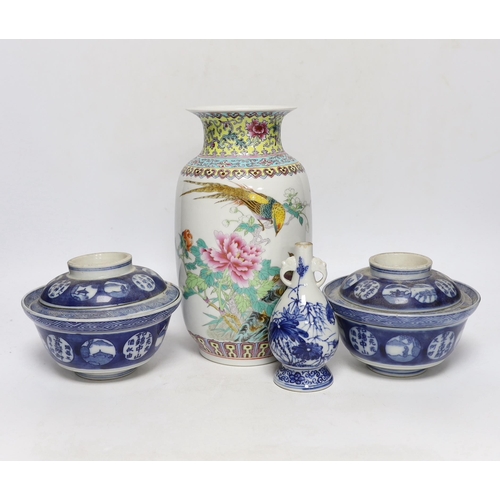 253 - A Chinese famille rose vase, two Japanese blue and white rice bowls and covers and a Japanese blue a... 