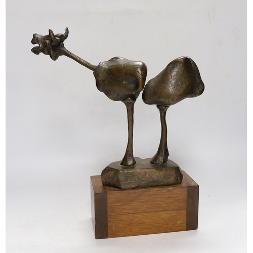 257 - An abstract bronze model of a cow, 34cm