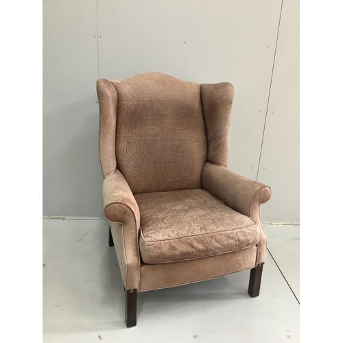 40 - A Victorian style pale brown leather wing armchair, width 81cm, depth 75cm, height 110cm