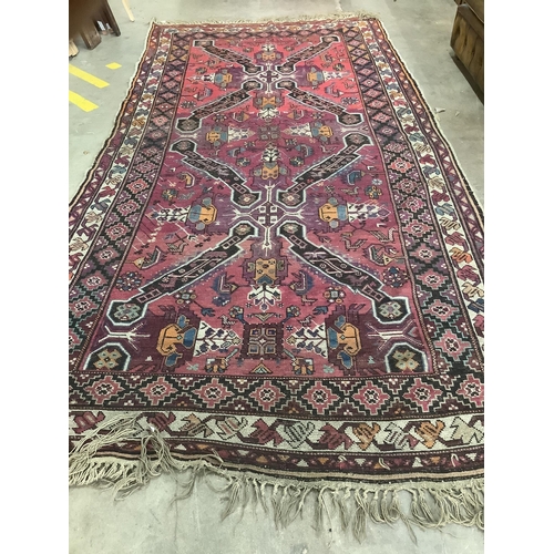 42 - A Caucasian carpet, 330 x 180cm