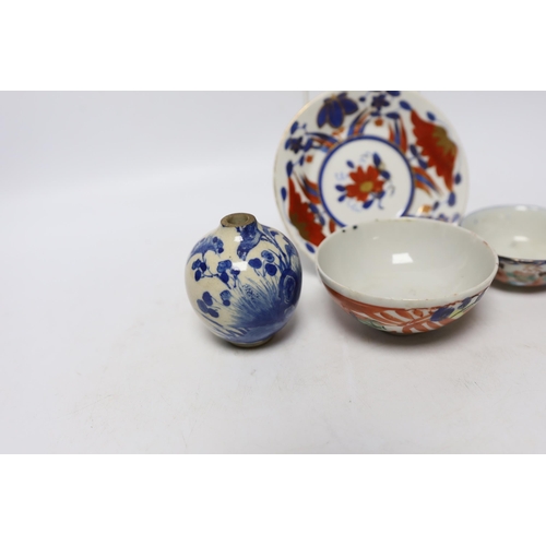 479 - A Chinese soft paste porcelain miniature vase, two small bowls, and a small dish, vase 7cm (4)... 