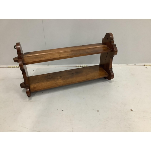 50 - A late Victorian walnut two tier wall bracket, width 74cm, depth 20cm, height 37cm