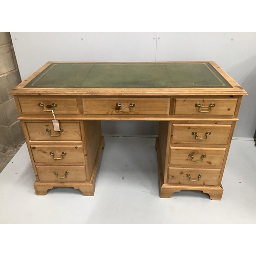 52 - A Victorian style pine pedestal desk, width 128cm, depth 63cm, height 78cm.