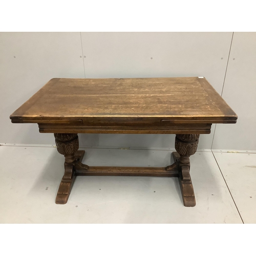 62 - An 18th century style rectangular oak draw leaf dining table, length 210cm extended, width 77cm, hei... 