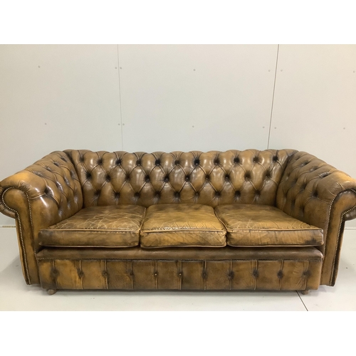 66 - A Victorian style buttoned leather Chesterfield settee, width 210cm, depth 88cm, height 74cm