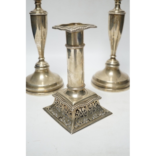 846 - A pair of Victorian silver candlesticks, on pierced swept bases, William Leuchars, London, 1886, 15.... 