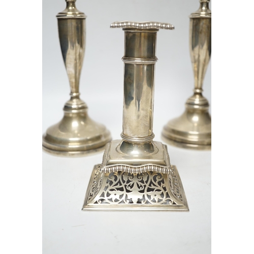 846 - A pair of Victorian silver candlesticks, on pierced swept bases, William Leuchars, London, 1886, 15.... 