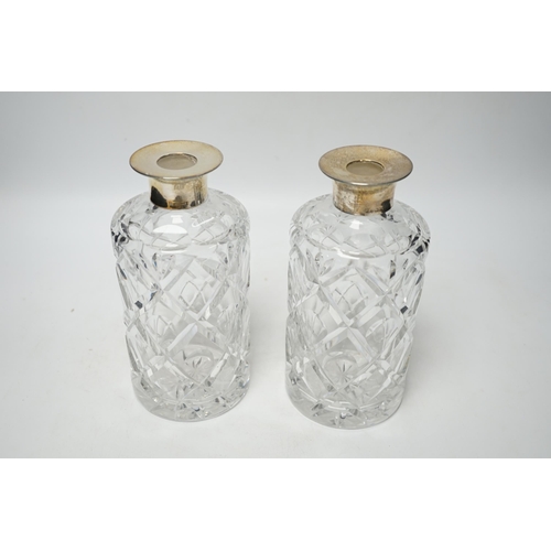 856 - A modern pair of silver mounted cut glass cylindrical decanters with stoppers, Birmingham, 1971/73, ... 