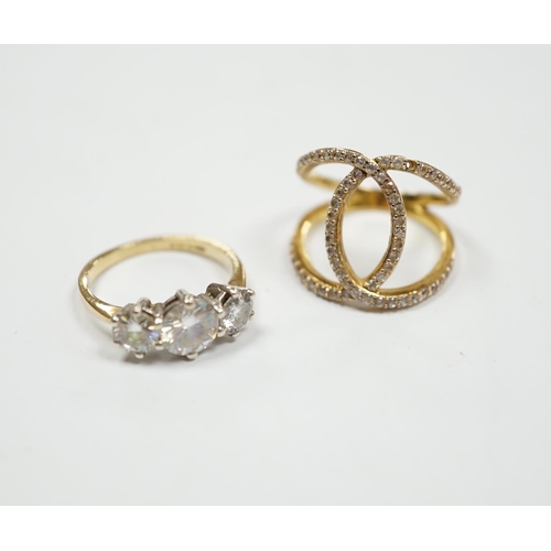 905 - A 9ct gold and three stone simulated diamond ring and a gilt 925 ring.