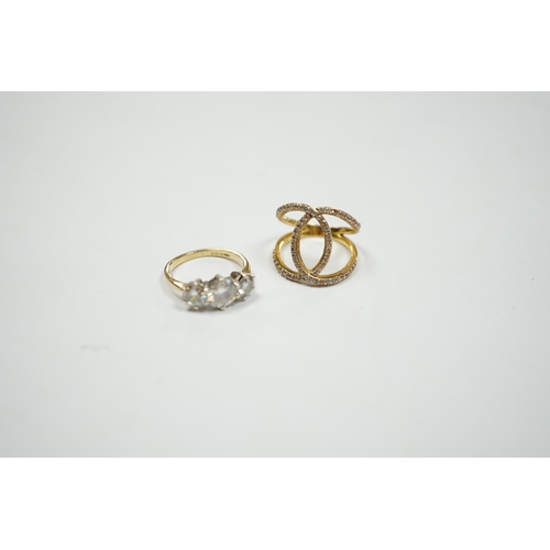 905 - A 9ct gold and three stone simulated diamond ring and a gilt 925 ring.