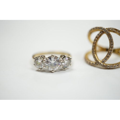 905 - A 9ct gold and three stone simulated diamond ring and a gilt 925 ring.