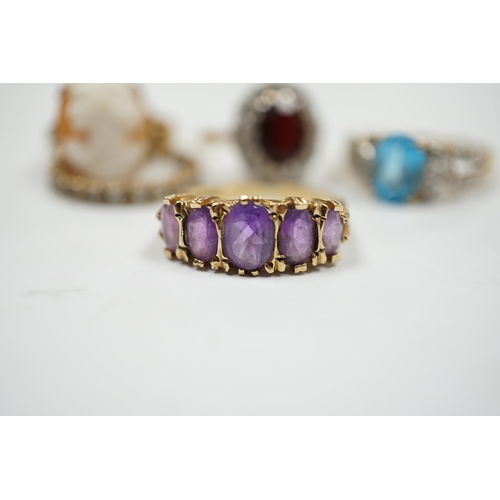 908 - Five assorted modern 9ct and gem set dress rings, including graduated five stone amethyst and cameo ... 