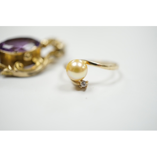 911 - A late Victorian yellow metal mounted amethyst brooch, 38mm pendant and a 10k, cultured pearl and di... 