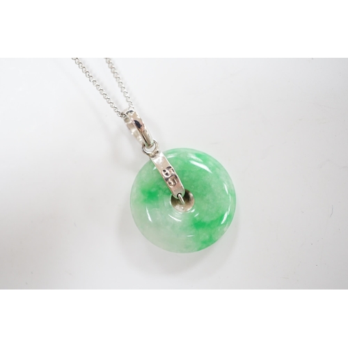 913 - A modern 14k white metal and jade set disc pendant, 18mm, on a 9ct white gold chain, 42cm, gross wei... 