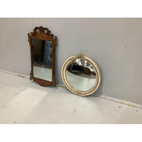 101 - An 18th century style walnut fret cut wall mirror, width 37cm, height 67cm together with a circular ... 