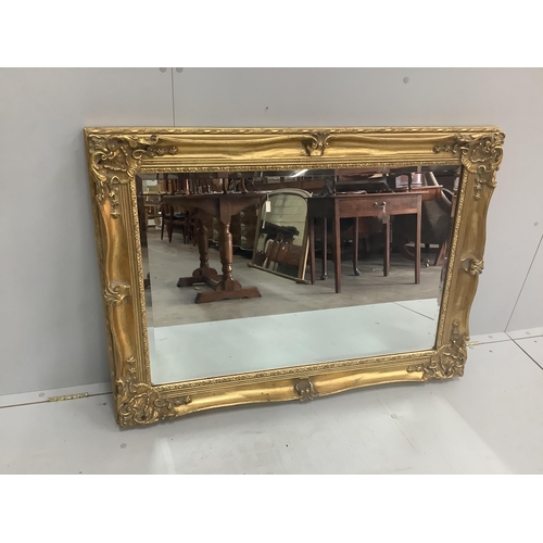 109 - A Victorian style rectangular gilt composition wall mirror, width 109cm, height 79cm