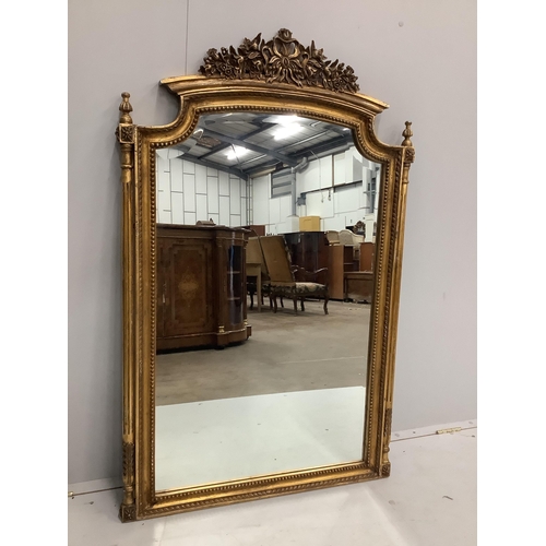 12 - A Victorian style gilt composition wall mirror, width 82cm, height 130cm