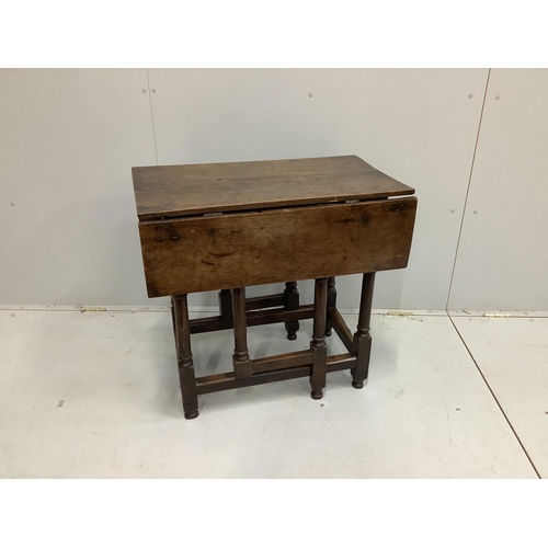 1044 - An 18th century oak drop flap table, width 46cm, depth 76cm, height 72cm