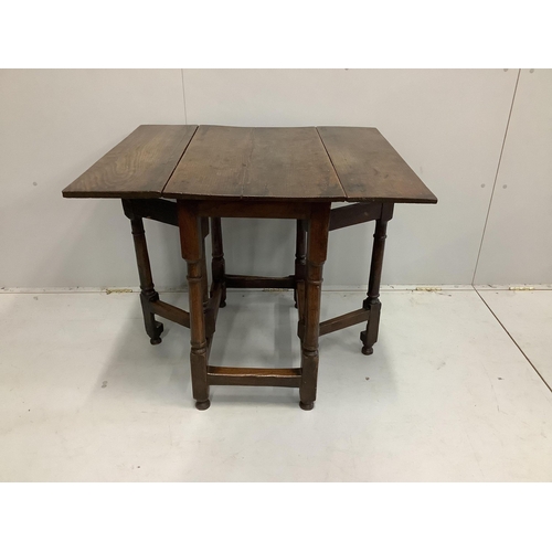 1044 - An 18th century oak drop flap table, width 46cm, depth 76cm, height 72cm