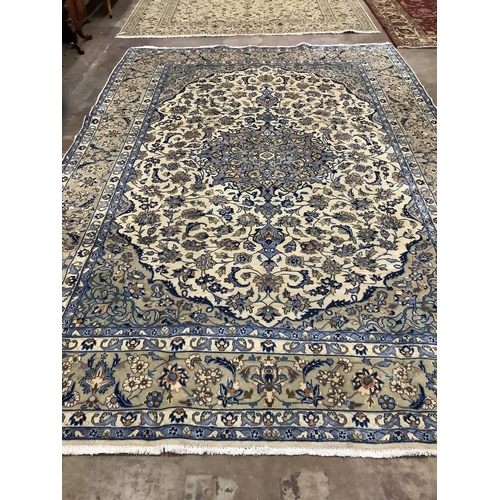 1047 - A Najaf Abad ivory ground carpet, 340 x 240cm