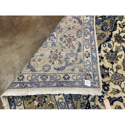 1047 - A Najaf Abad ivory ground carpet, 340 x 240cm