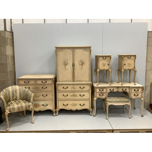 1101 - An 18th century style painted seven piece bedroom suite, comprising press cupboard, pair of bedside ... 