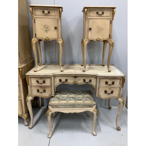 1101 - An 18th century style painted seven piece bedroom suite, comprising press cupboard, pair of bedside ... 