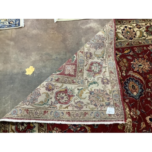 1102 - A Tabriz mid ground carpet, 320 x 220cm