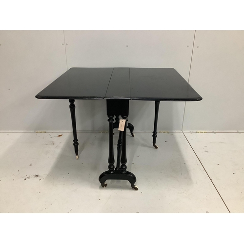 1105 - A 19th century ebonised Sutherland table, width 90cm, depth 17cm, height 72cm