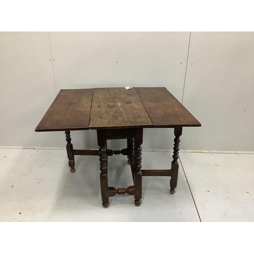 1107 - A small 18th century and later oak drop flap table, width 38cm, depth 82cm, height 71cm