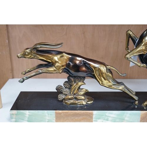 1284 - An Art Deco antelope group on marble base, signed, Limousin, 70cm