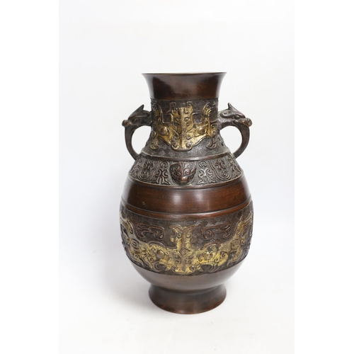 1329 - A Chinese gold splashed bronze vase, Qing period, 30cm