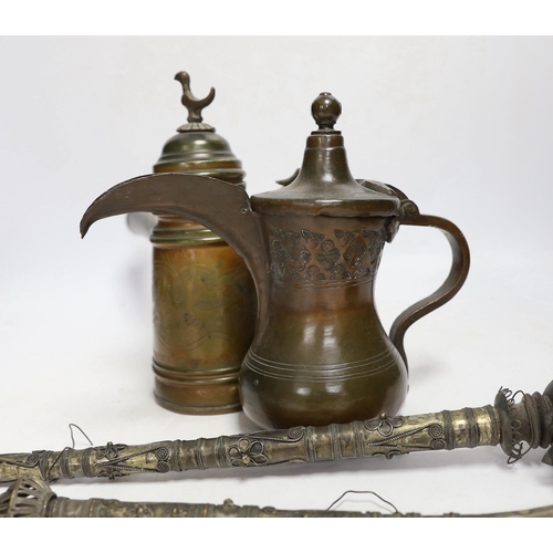 1335 - Two Indian opium pipes, and two Dallah coffee pots, tallest pot 22cm