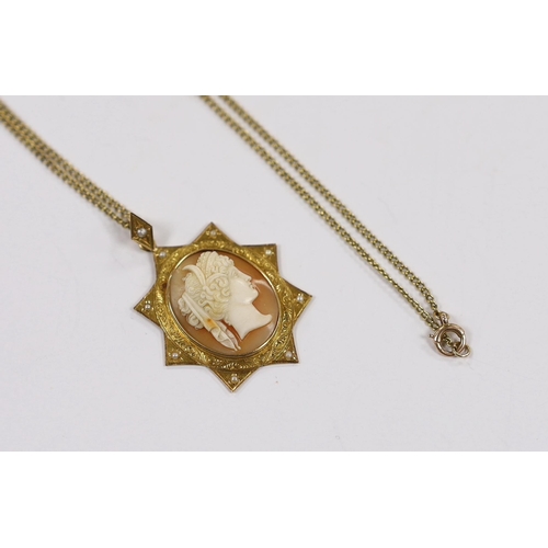 1891 - A Victorian yellow metal and seed pearl set cameo shell pendant, 40mm on a 15ct fine link chain, 44c... 