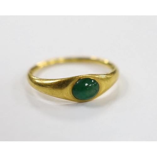 1895 - A Roman high carat yellow metal and single stone cabochon emerald set ring, size L, gross weight 3.7... 