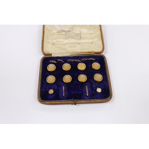 1909 - An early 20th century 9ct and chalcedony set ten piece dree stud set, in fitted gilt tooled leather ... 