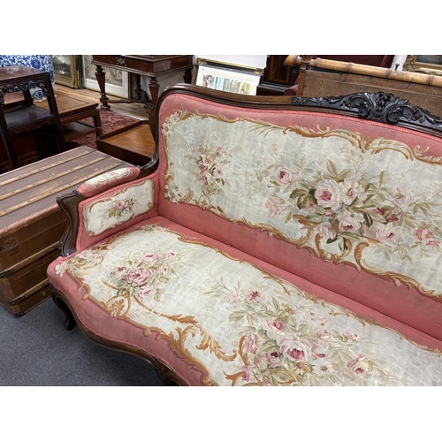 120 - A 19th century French rosewood settee with floral needlepoint upholstery, width 198cm, depth  66cm, ... 