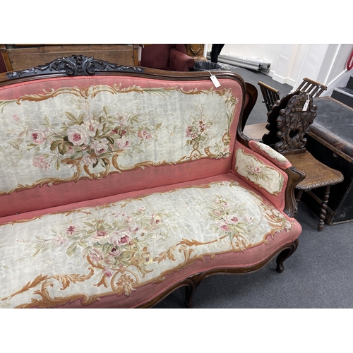 120 - A 19th century French rosewood settee with floral needlepoint upholstery, width 198cm, depth  66cm, ... 