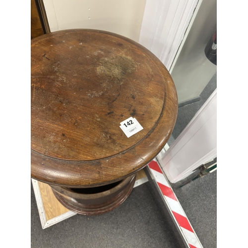 142 - A Victorian mahogany cylinder cupboard, diameter 45cm, height 75cm