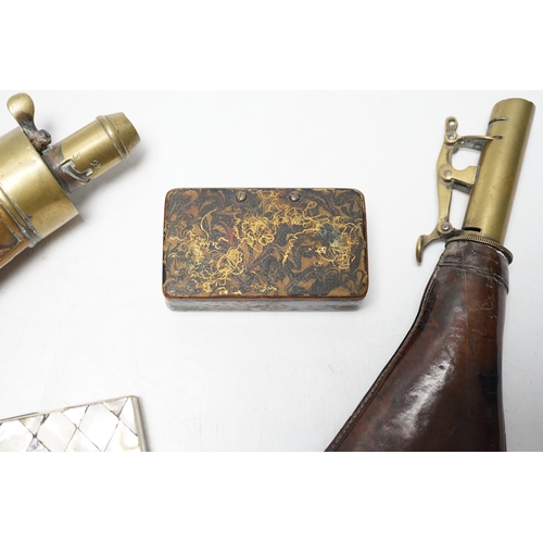 264 - A Victorian embossed brass powder flask, a leather shot flask and a Victorian mother of pearl and ab... 