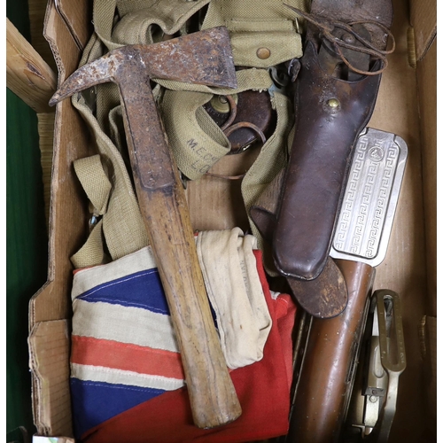 267 - A collection of militaria including a union flag, gunners sight, camouflage webbing, a water bottle,... 