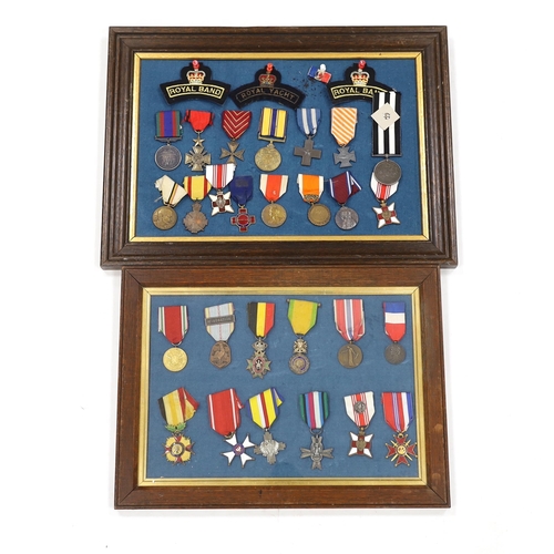 274 - Twenty-seven medals and awards mounted in oak frames, including; French 1939-45 War Medal, Poland Le... 