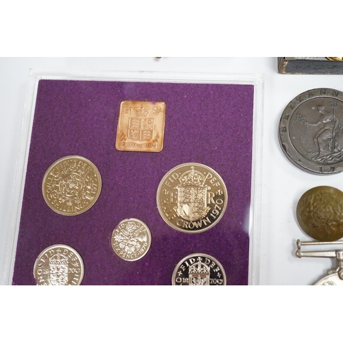 279 - A collection of medals and coins including; an original card Air Ministry box containing a 1939-45 s... 