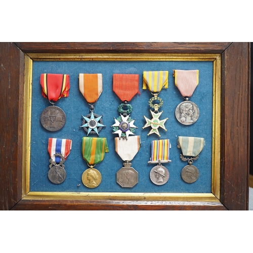 285 - Eighteen French medals, including The War Cross, TOE French Legion Cross, Medal of Honour, Croix du ... 