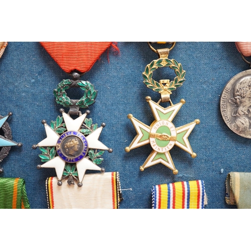 285 - Eighteen French medals, including The War Cross, TOE French Legion Cross, Medal of Honour, Croix du ... 