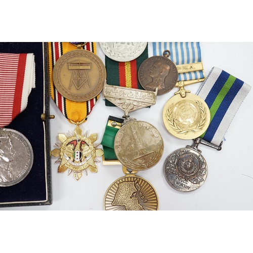 287 - Thirty world military and commemorative medals including; a Belgium War Aid Medal 1914-18, Nigeria R... 